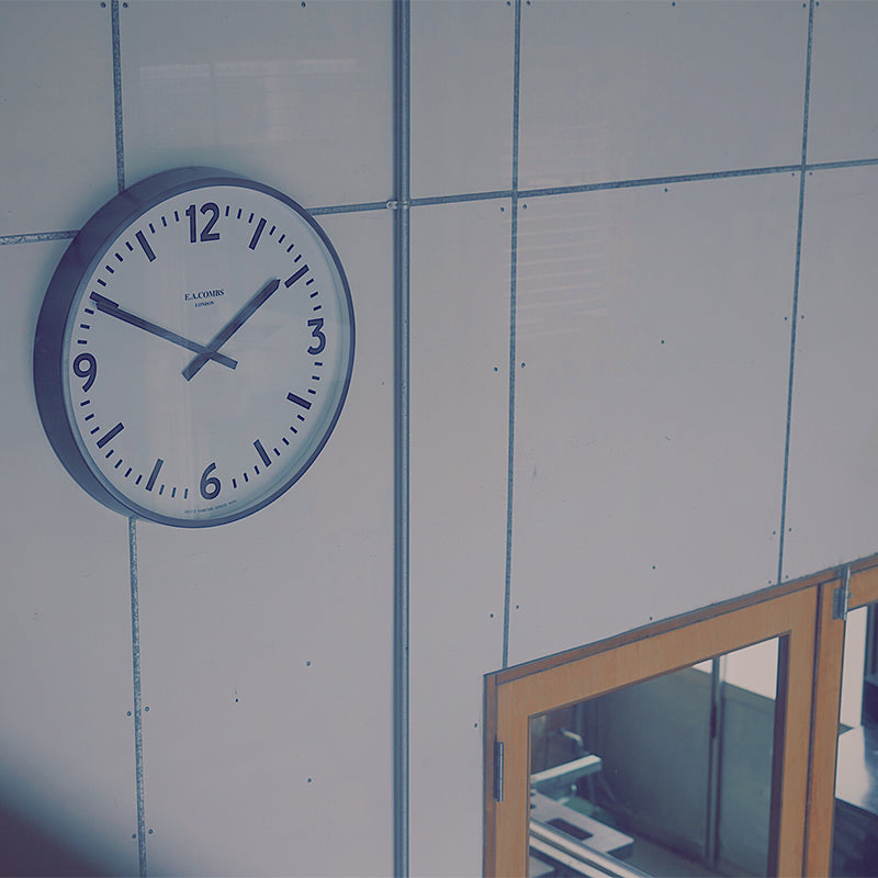E.A. COMBS WALL CLOCK - (L) Φ630