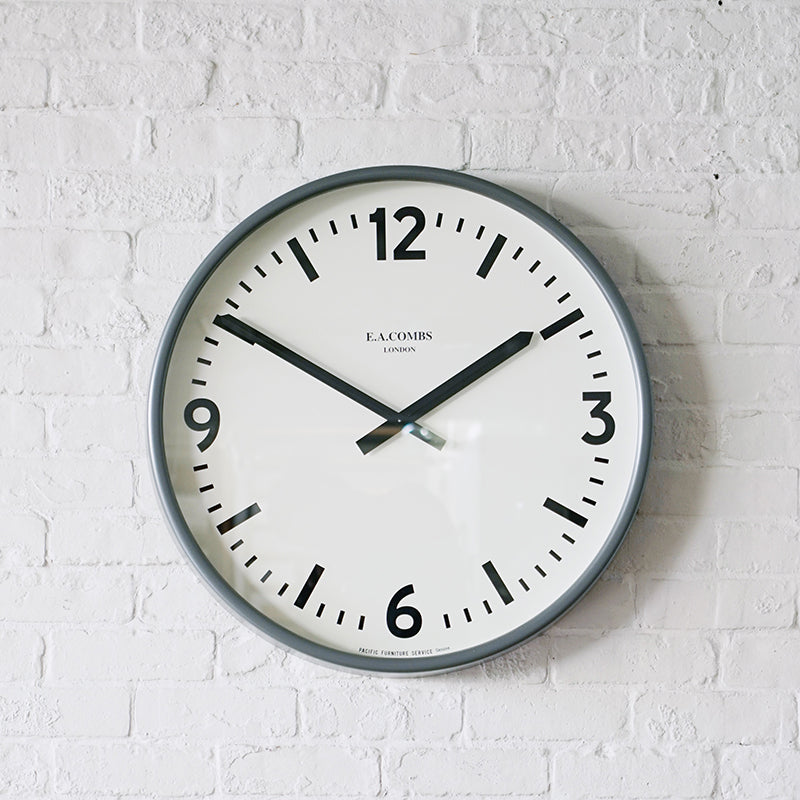 E.A. COMBS WALL CLOCK - (L) Φ630