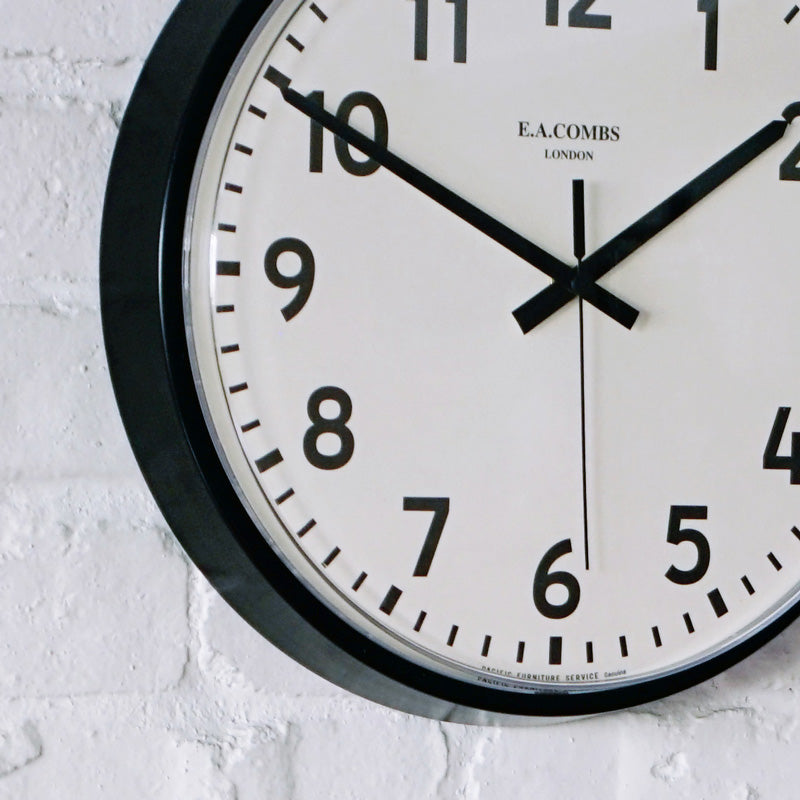 E.A. COMBS WALL CLOCK - (S) Φ315